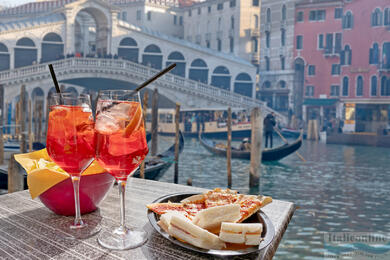 What is Aperitivo italiano - food or drink? Both together and something more!